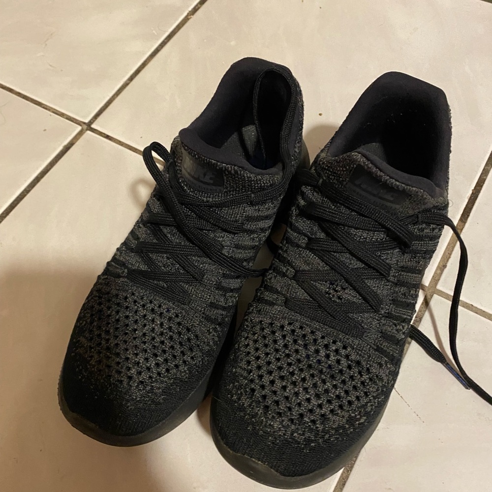 Size 5 black Nike running shoes